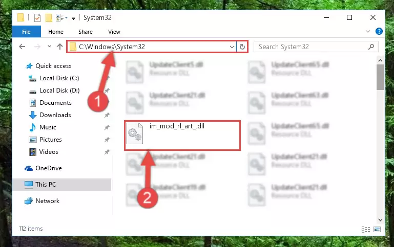 Pasting the Im_mod_rl_art_.dll library into the Windows/System32 directory