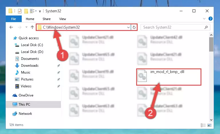 Pasting the Im_mod_rl_bmp_.dll library into the Windows/sysWOW64 directory