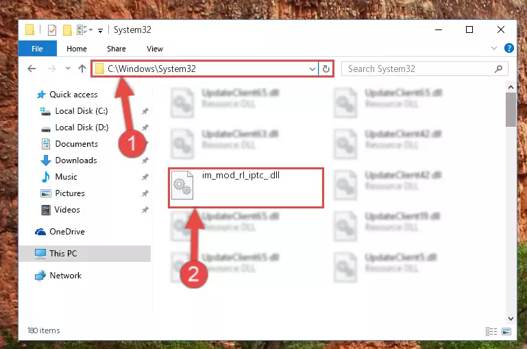 Pasting the Im_mod_rl_iptc_.dll file into the Windows/System32 folder