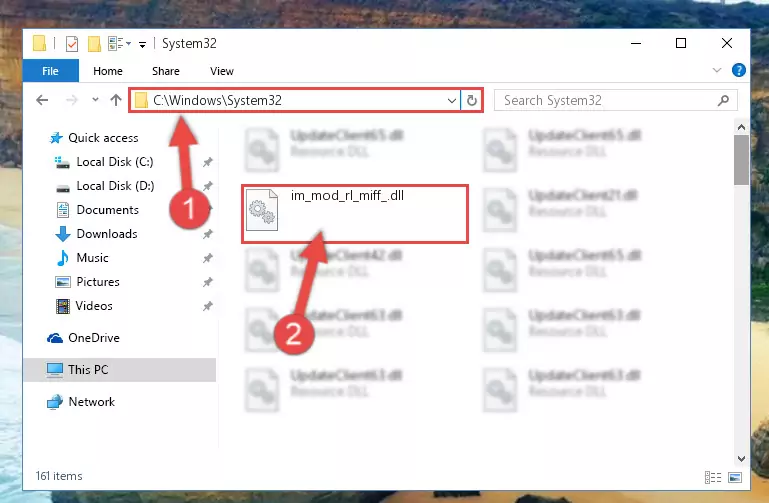 Pasting the Im_mod_rl_miff_.dll library into the Windows/System32 directory