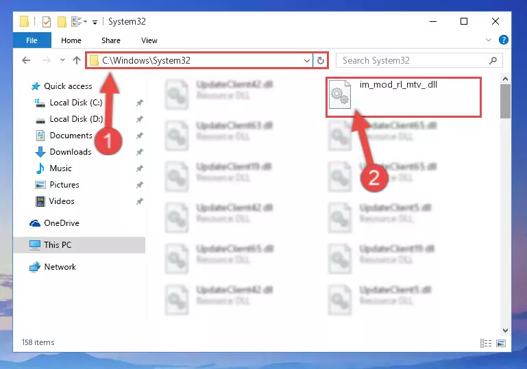 Pasting the Im_mod_rl_mtv_.dll library into the Windows/System32 directory