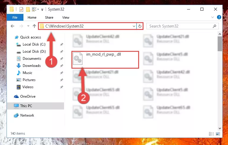 Pasting the Im_mod_rl_pwp_.dll file into the Windows/System32 folder