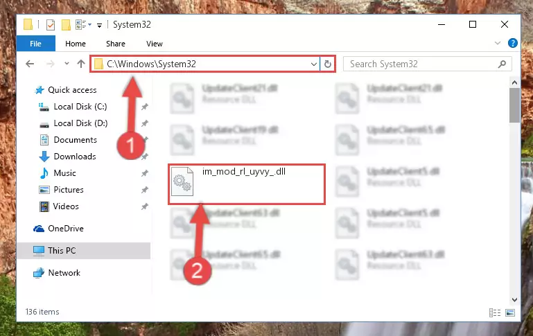 Pasting the Im_mod_rl_uyvy_.dll file into the Windows/System32 folder