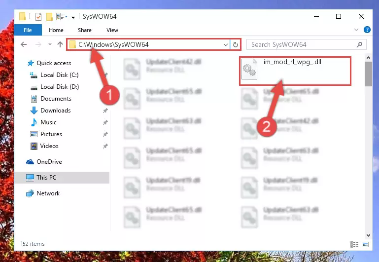 Pasting the Im_mod_rl_wpg_.dll file into the Windows/sysWOW64 folder