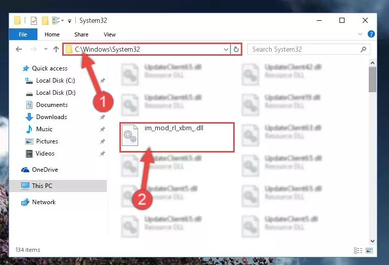 Pasting the Im_mod_rl_xbm_.dll library into the Windows/sysWOW64 directory