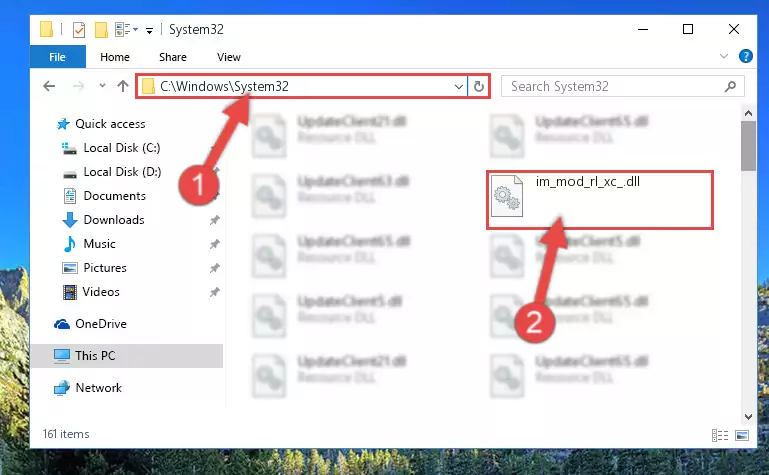 Pasting the Im_mod_rl_xc_.dll library into the Windows/sysWOW64 directory