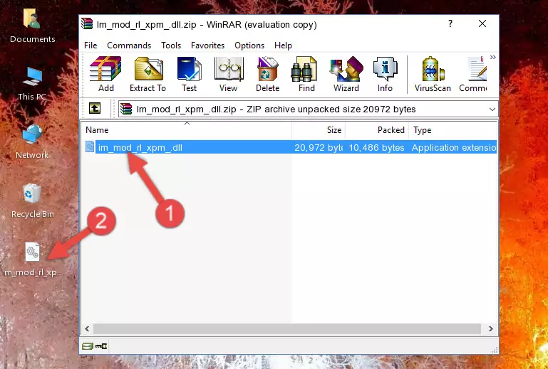 Pasting the Im_mod_rl_xpm_.dll file into the software's file folder