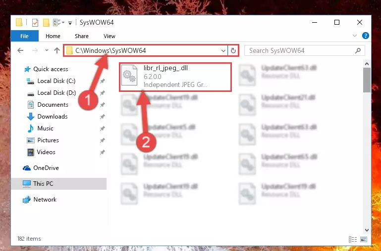 Pasting the Libr_rl_jpeg_.dll library into the Windows/sysWOW64 directory