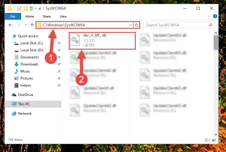 Pasting the Libr_rl_tiff_.dll library into the Windows/sysWOW64 directory