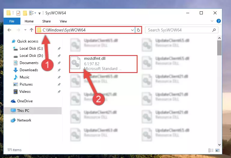 Pasting the Msstdfmt.dll file into the Windows/sysWOW64 folder