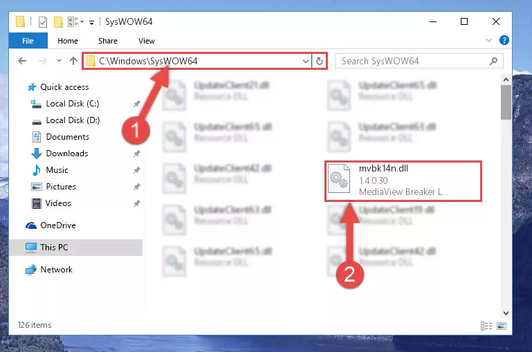 Pasting the Mvbk14n.dll file into the Windows/sysWOW64 folder