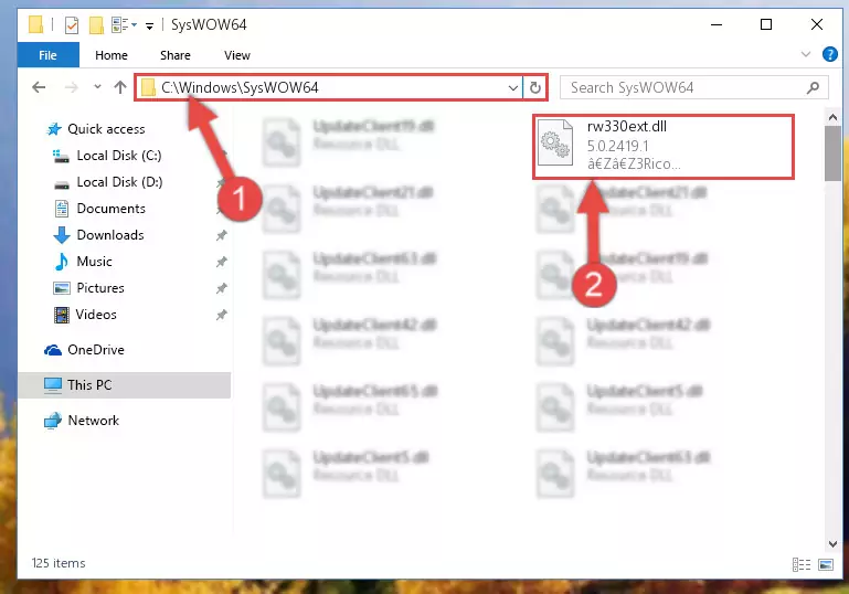 Pasting the Rw330ext.dll file into the Windows/sysWOW64 folder