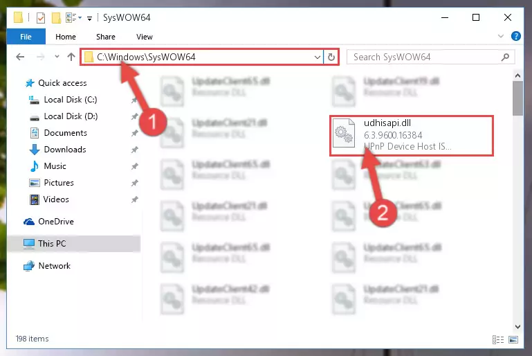 Pasting the Udhisapi.dll file into the Windows/sysWOW64 folder